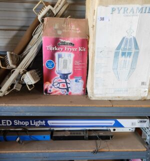 u38- Several boxes of lighting and turkey fryer kit