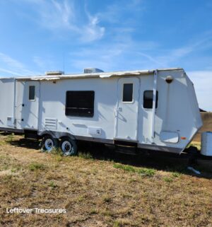 u303- (See Video) 2004 RVSIN 28 Foot Travel Trailer. 28RBXS w/ slide out. Last used in 2024. Currently Registered until Sept 2026. Sold with generator and all accessories and contents.