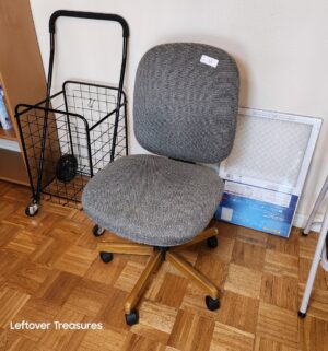 v54- Rolling office chair. Used as dining chair
