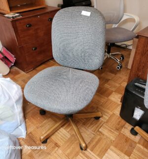 v55- Rolling office chair. Used as dining chair