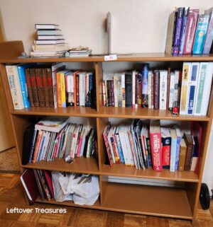 v64- All books and media on bookcase
