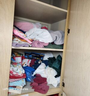 v81- misc linen, household items in cabinets