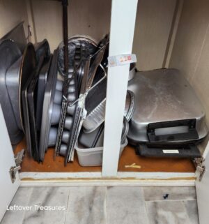 v118- cabinet of bakeware