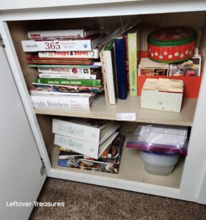 v133- cook books in bottom cabinet