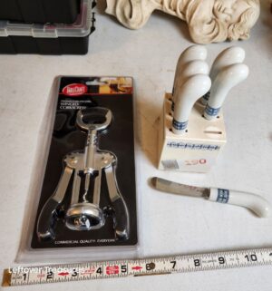 v190- bottle opener. Butter knives