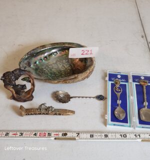 v221- shell, collectible spoons, figurines