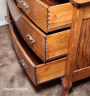 w32- quarter sawn oak barrel front dresser with a beveled mirror - Image 6