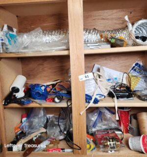 w61- contents of the laundry room cabinets