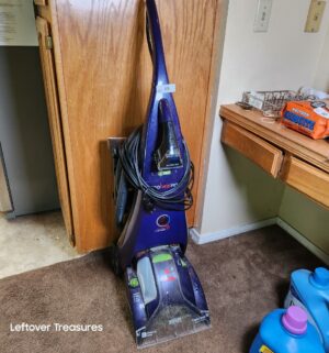 w65- Bissell Heated Carpet Cleaner. Powers on