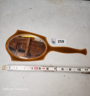 w259- vintage green Bakelite or celluloid Art Deco hand mirror
