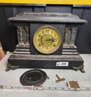 w280- antique mantel clock w/ key. Clock not tested