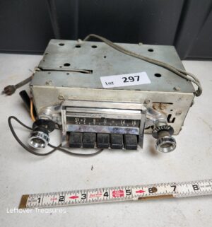 w297- appears to be a vintage 1957 Chevrolet Wonder Bar AM radio