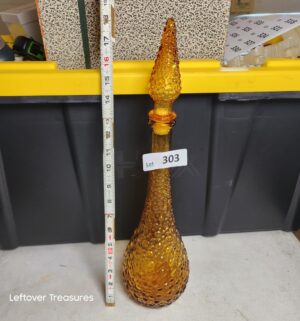 w303- vintage Empoli Italian amber glass genie bottle with a hobnail textured pattern and stopper