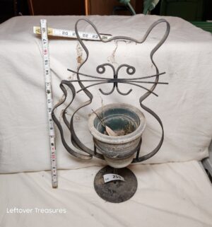 x255- decorative wrought iron cat planter with a clay flower pot