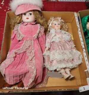 b1- These dolls resemble vintage Seymour Mann porcelain collector dolls