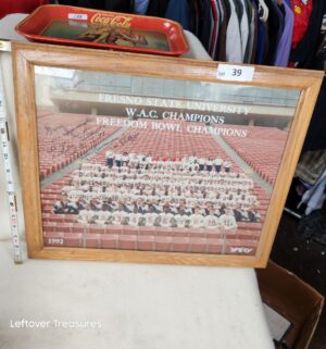 b39- 1992 Fresno State football WAC Champions. Signed by Jim Sweeney. NO COA