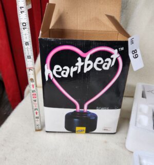 b89- Heartbeat Lite F/X Attitude Lighting features a neon-style pink heart mounted on a black base