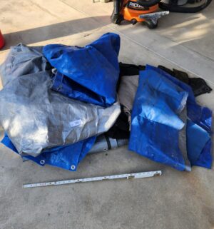 y20- Usable tarps. 2 are cut in half
