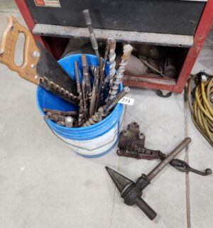 y273- drill bits and tools in bucket - Image 1