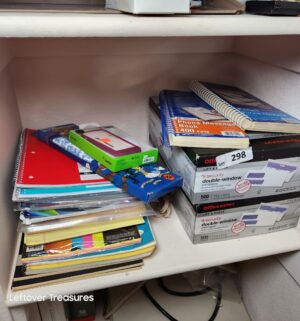 y298- office supplies on shelf - Image 1