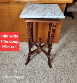 y305- French Country-style pedestal table features a white marble top - Image 1