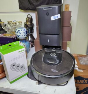y399- iRobot Roomba Vacuum System - Image 1