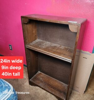 a25- Wooden Bookcase w/ 2 adjustable shelves. Missing pegs for 2nd shelf