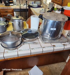 a47- 2 skillets, pressure cooker, stockpot, baking rack - Image 1