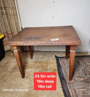 a57- Antique wooden accent table features a carved Greek key design apron - Image 1