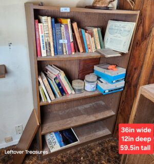 a77- Particle board bookcase - Image 1