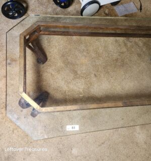 a83- Glass top coffee table. VERY HEAVY. No major chips seen - Image 2