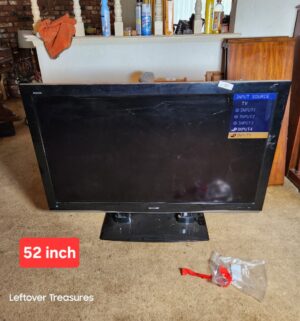 a87- Sharp Aquos 52 in TV Monitor w/ remote - Image 1