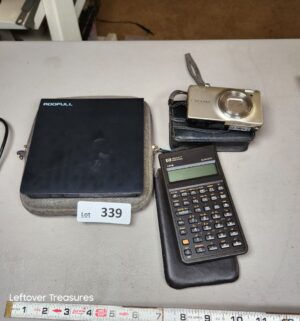 a339- calculator, nikon camera, CD RW - Image 1