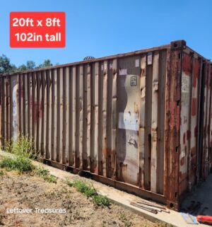 a452- (SEE VIDEO TOUR) 1980s used 20-foot shipping container. Car Parts not included