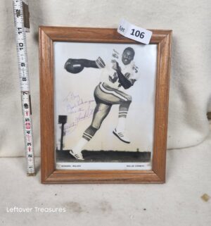 b106- autographed black and white photograph of Dallas Cowboys running back Herschel Walker. NO COA