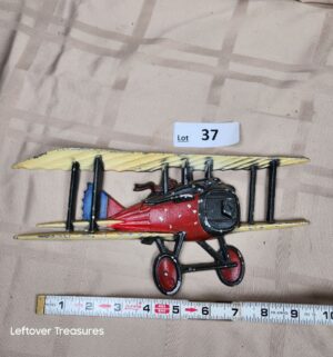 c37- 1975 Homco cast metal biplane wall hanging