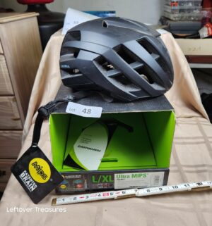 c48- Performance Bicycle road bike helmet in size Large/XL, designed with MIPS technology