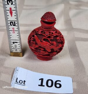 c106- red carved cinnabar lacquer snuff bottle. Seems newer. Not vintage or antique. Stem is inside