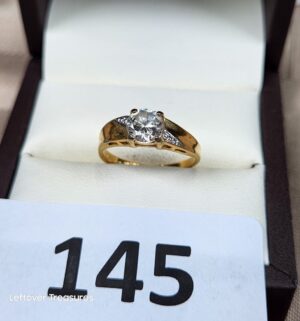 c145- 14k gold plated ring w/ cz solitaire