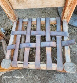 d127- rustic, handmade wooden chairs feature a log frame and a woven leather strap seats - Image 3