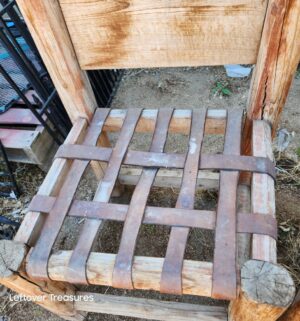 d127- rustic, handmade wooden chairs feature a log frame and a woven leather strap seats - Image 4