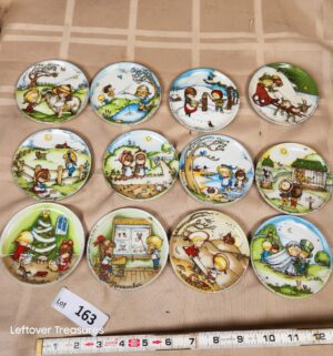 d163- 12-piece set of Joan Walsh Anglund Months of the Year collector plates from 1966