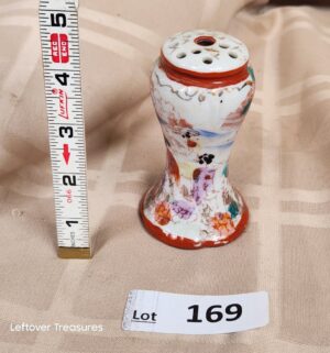 d169- hand-painted porcelain hat pin holder featuring a Geisha girl theme