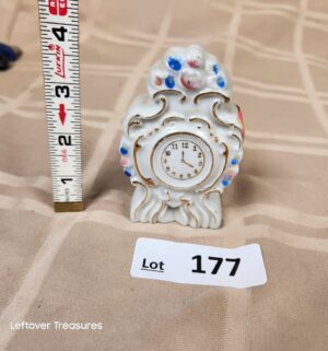 d177- occupied Japan miniature mantel clock figurine